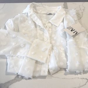 White puff button up from Zara in Paris. Size small. New with tags
